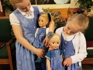 Matching sister and dolls outfits